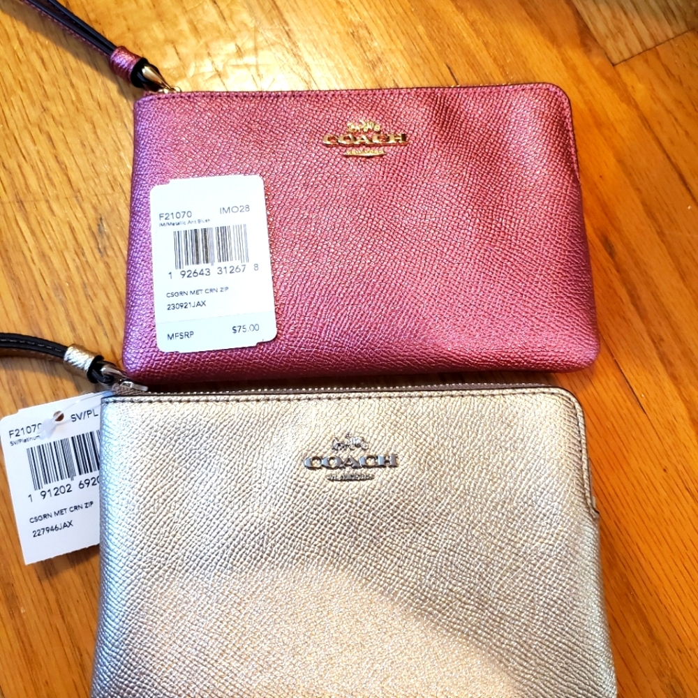 Coach metallic rose or gold wristlet